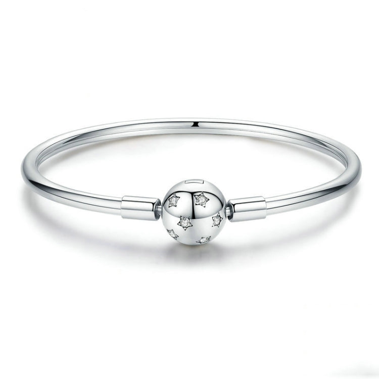 Sterling silver star bead bracelet with round star centerpiece, polished silver cuff