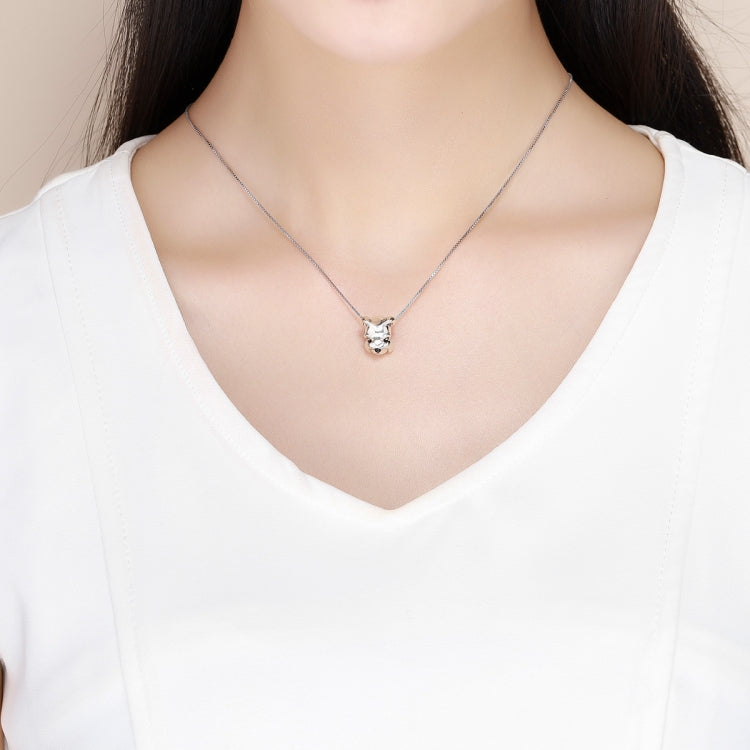 Sterling silver necklace with small schnauzer pendant charm centered on a thin chain