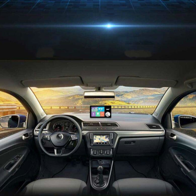 Car dashboard setup with a small mounted DAB+ receiver on the center console