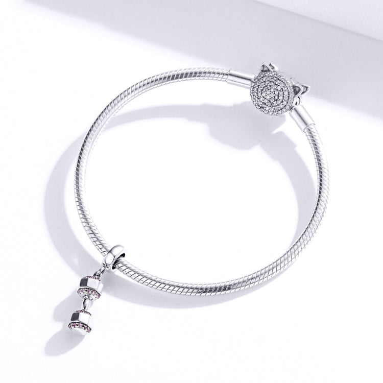 Snake-chain bracelet with dangling sterling silver dumbbell fitness charm with pink CZ