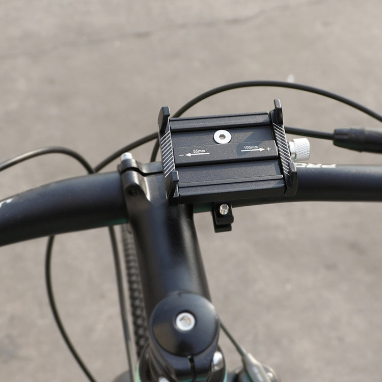 Black phone holder cradle mounted on handlebars with adjustable side rails