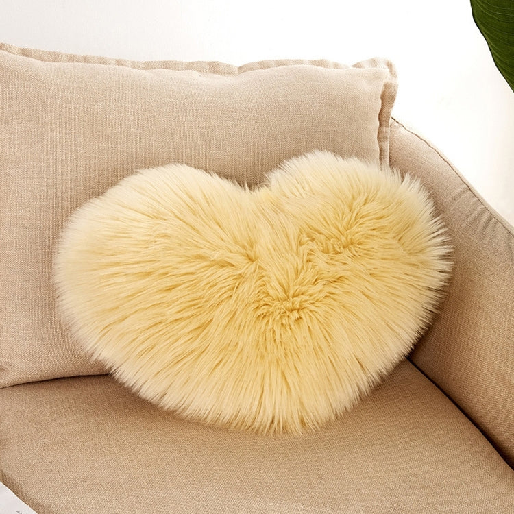 Yellow heart-shaped faux fur pillow cover with soft fluffy texture
