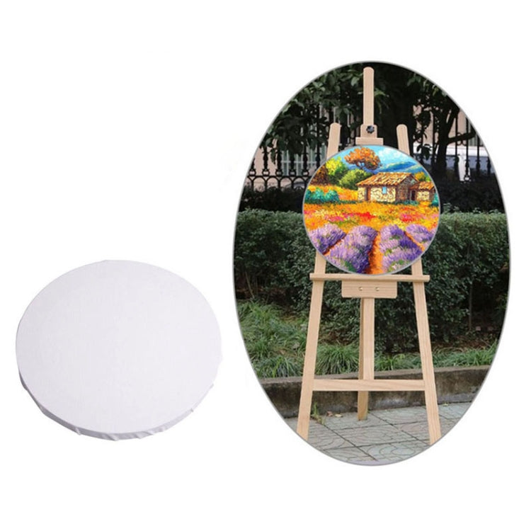 Round white canvas board set with blank painting panels, wooden frame for art.