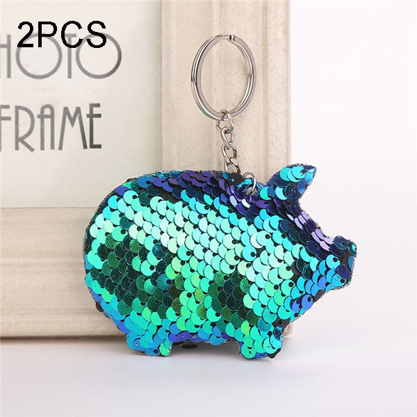 Blue sequin pig keychain with metal key ring and chain, shiny glitter detail