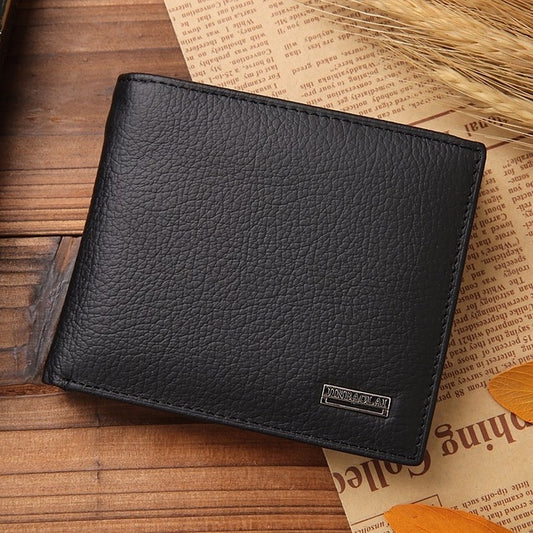 Black leather bifold wallet with rectangular logo patch on front