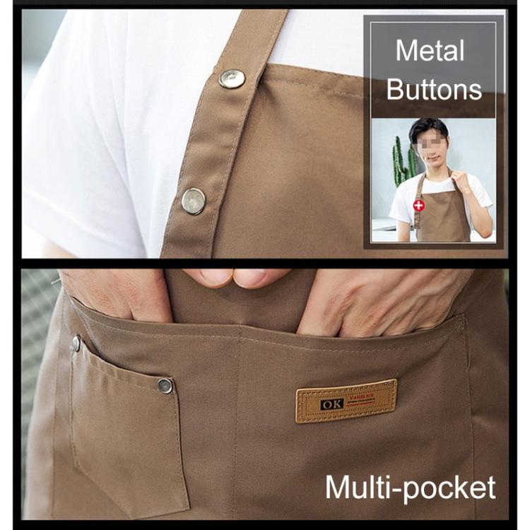 Brown kitchen apron detail with multiple pockets and metal button straps.
