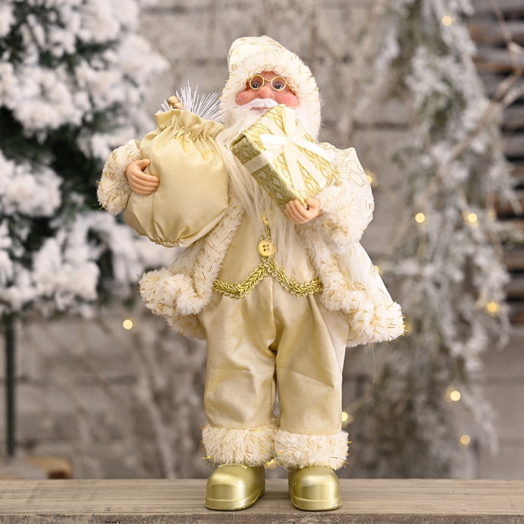 Standing Santa Claus doll ornament in cream suit with white beard, holding a gift