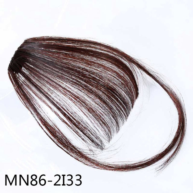 Chestnut-brown synthetic clip-in bangs hairpiece with lighter streaks