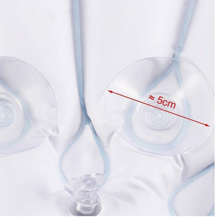 Clear suction cups on shell-shaped bath pillow, about 5 cm spacing