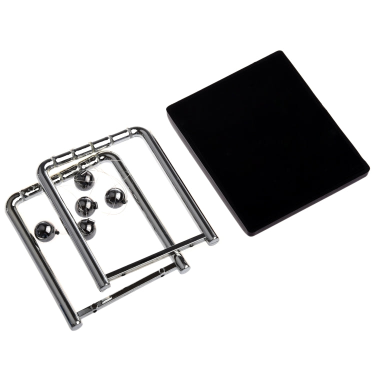 Newton pendulum ball demonstrator kit with chrome frame, steel balls, and dark base