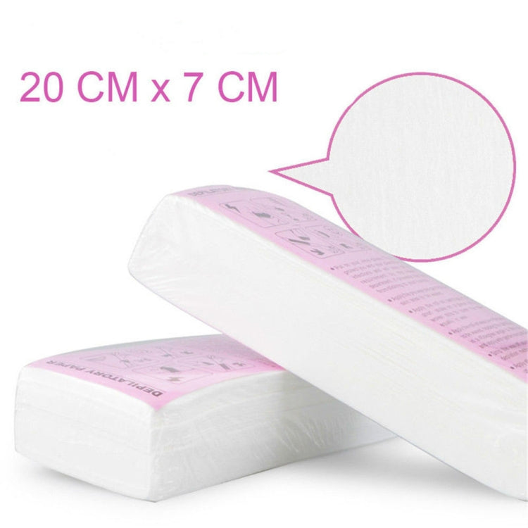 White wax hair removal paper strips with pink printed label, depilatory use