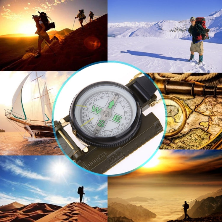 Army green multifunction compass tool with round dial and folding lens housing