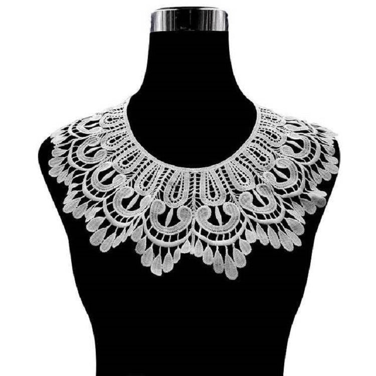 White lace fake collar on black fabric with scalloped embroidered neckline edge