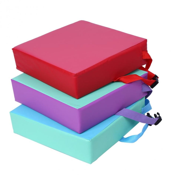 Stacked kids seat pads with buckle straps in red, purple, and teal foam cushions