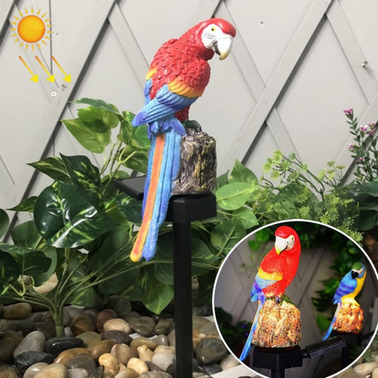 Red and blue resin parrot solar lawn lamp on a black stake base, garden decor