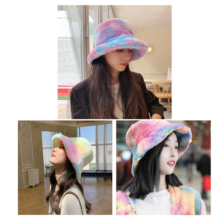Plush rainbow fisherman bucket hat, pastel rainbow colors on a model.