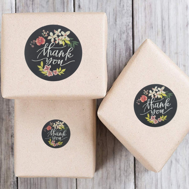 Beige envelopes with floral “Thank you” round seal stickers