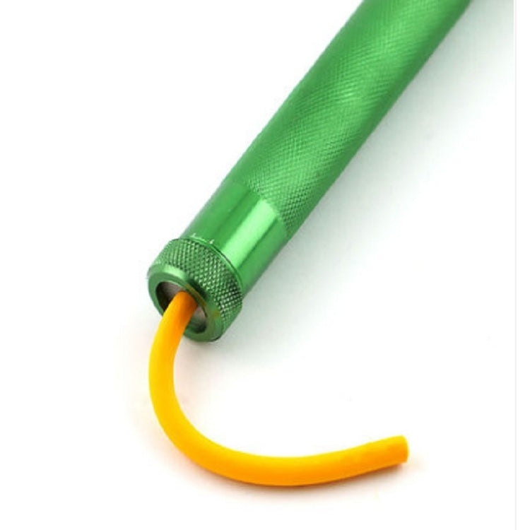 Green clay extrusion tool extruding yellow ribbon-shaped clay