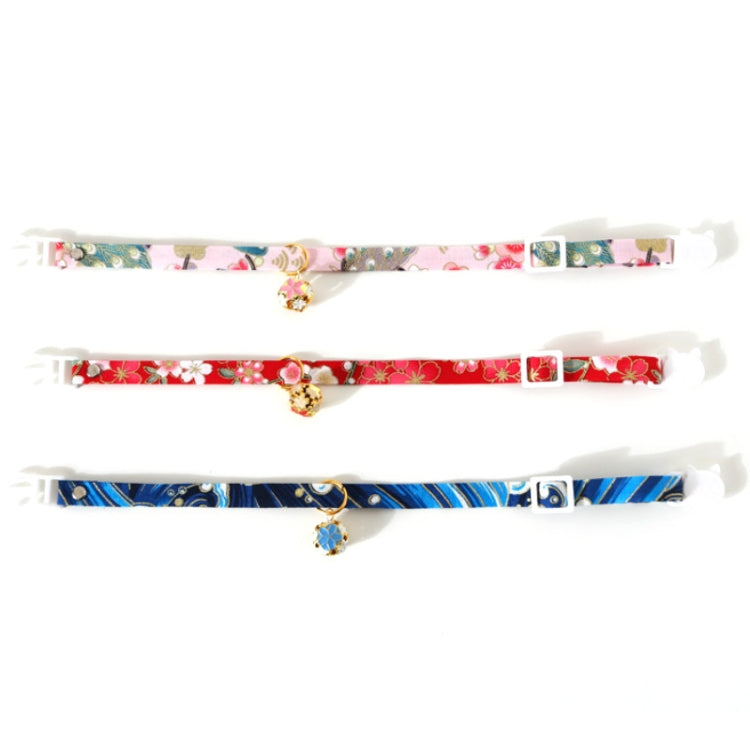 Set of three adjustable pet bell collars: pink, red, and blue patterned with bells