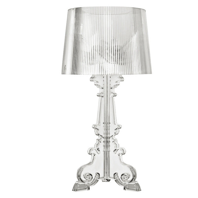 Transparent acrylic table lamp with ribbed shade and ornate crystal-like base