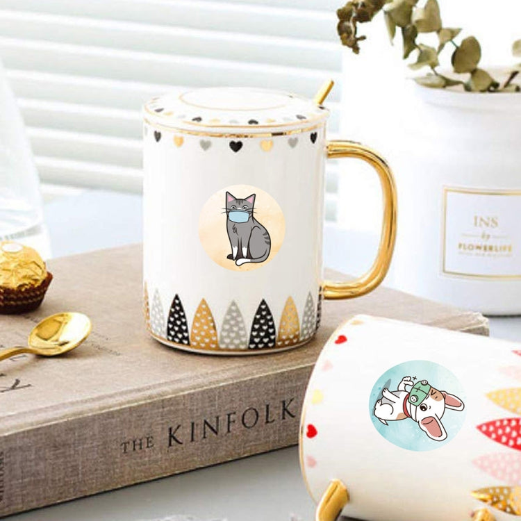 Cartoon pet reward stickers on a mug and lid, cat and dog motifs