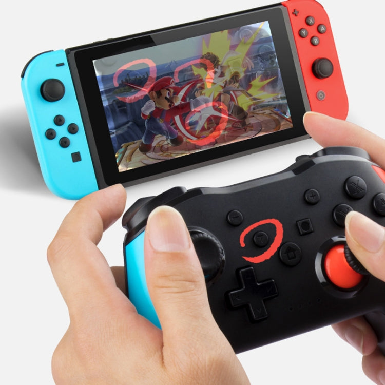 Wireless Bluetooth game controller, black with orange thumbsticks, D-pad and face buttons