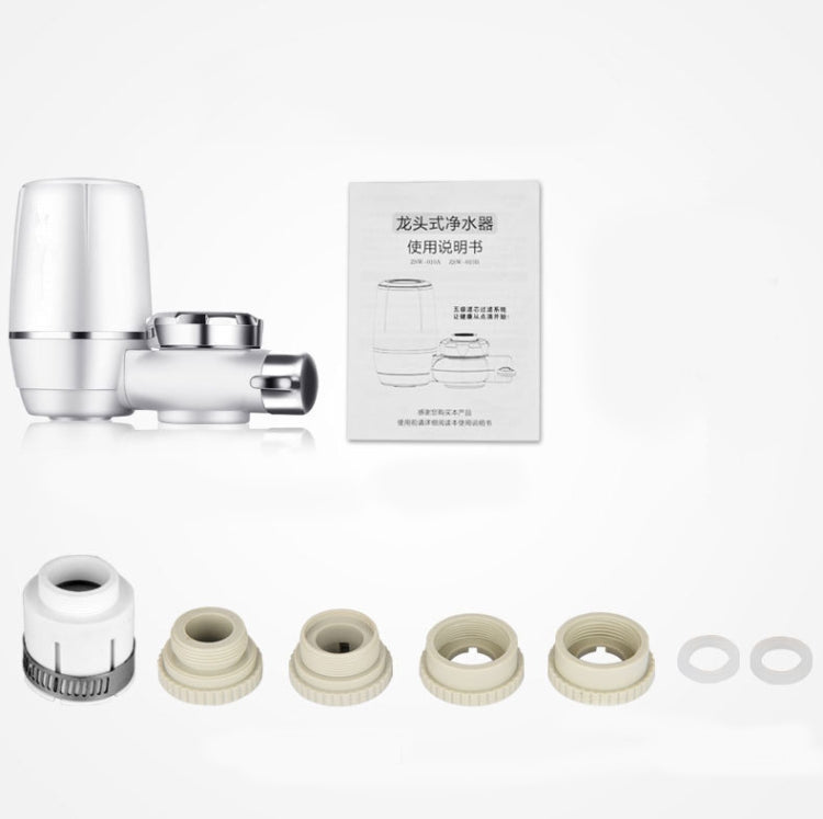 Faucet water purifier set with white filter parts and instruction sheet
