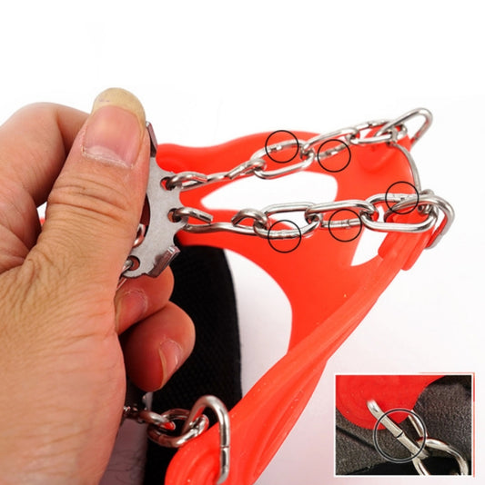 Orange crampon cover with stainless steel spike plate and linked chain straps