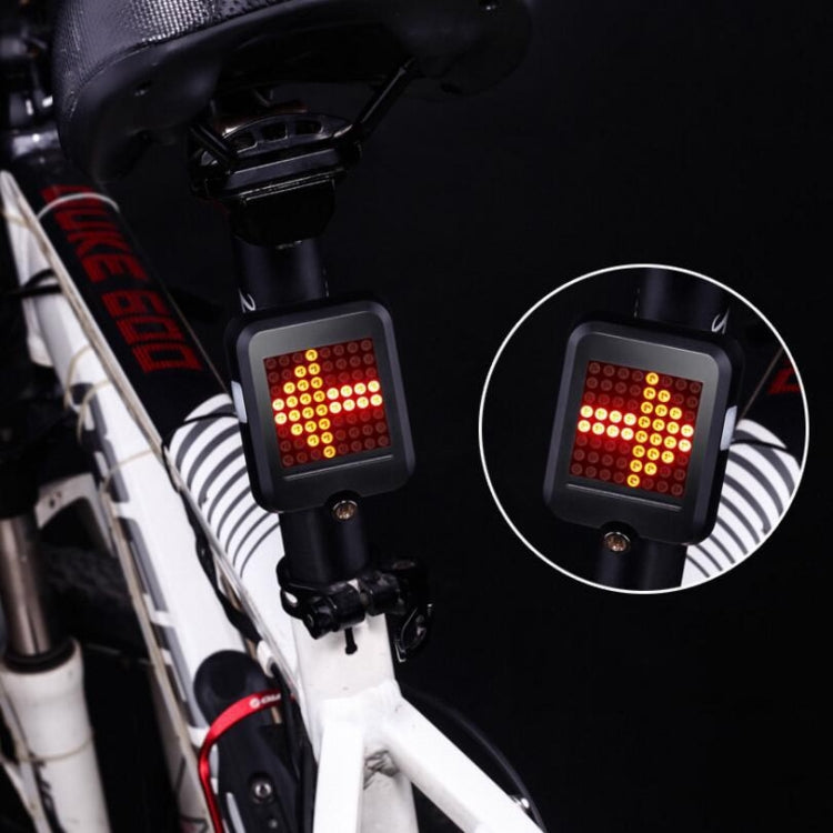Bike tail light on seatpost with bright red LED matrix in black square mount