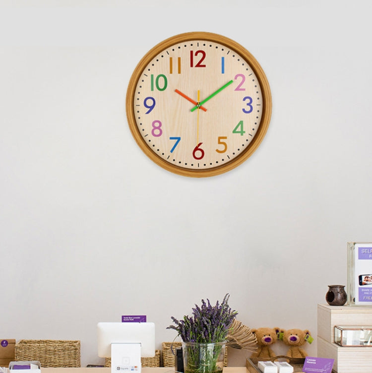 Wood grain wall clock with multicolor numerals on wall, round wooden frame