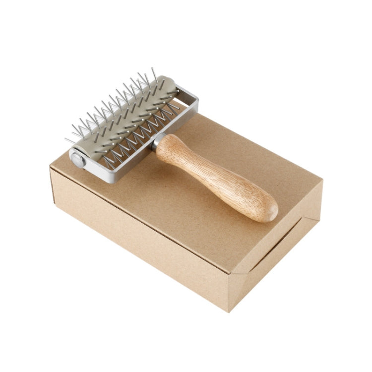 Pizza dough puncher roller in kraft gift box with wooden handle and stainless pins.