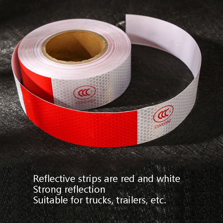 Red and white reflective tape roll shown in a loop with visible inner backing