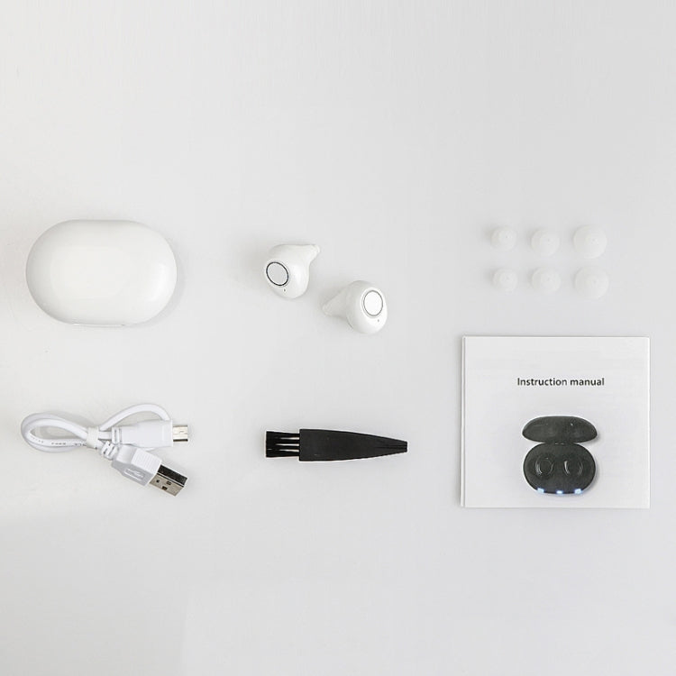 Wireless hearing aid kit: white charging case, earbuds, charging cable, and instruction manual