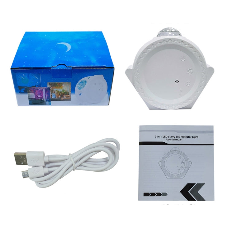 White starry-sky projector night light kit with USB cable and retail packaging.