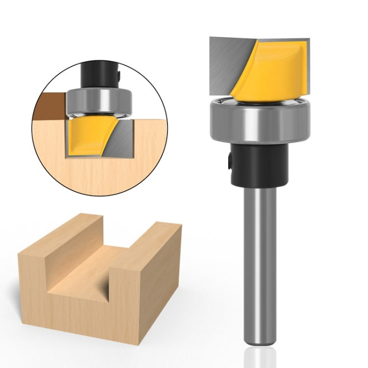 Wood trimming cutter with yellow insert mounted on shank, machining a wooden slot