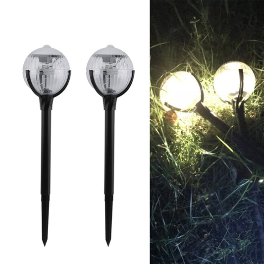 Set of two solar lawn lights with clear round globe heads and black stake bases