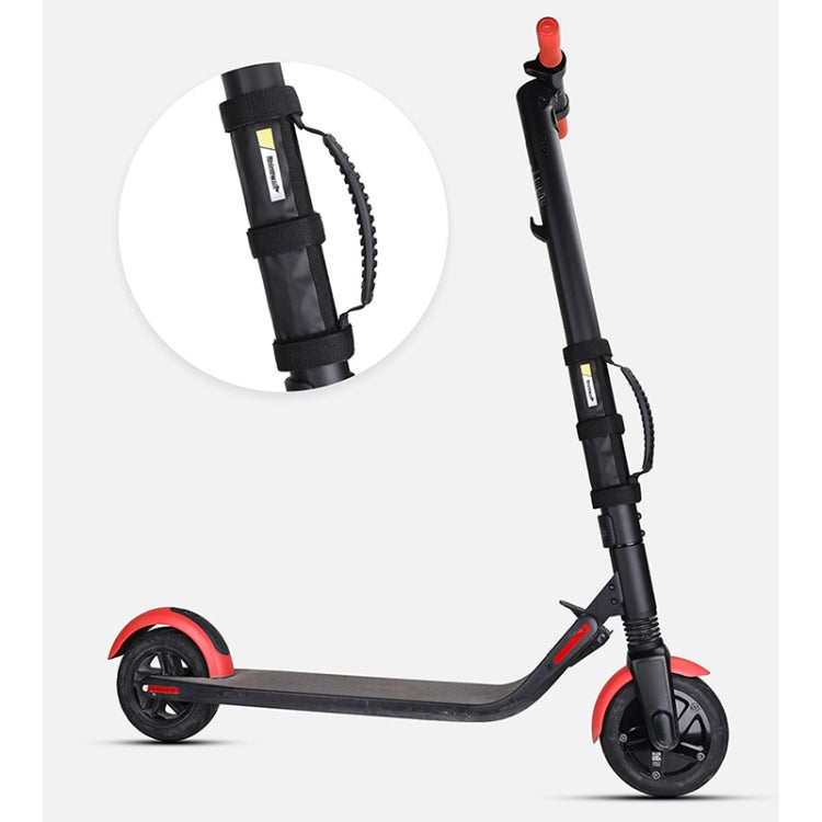 Balance bike strap handle attached to handlebar on black scooter with red accents