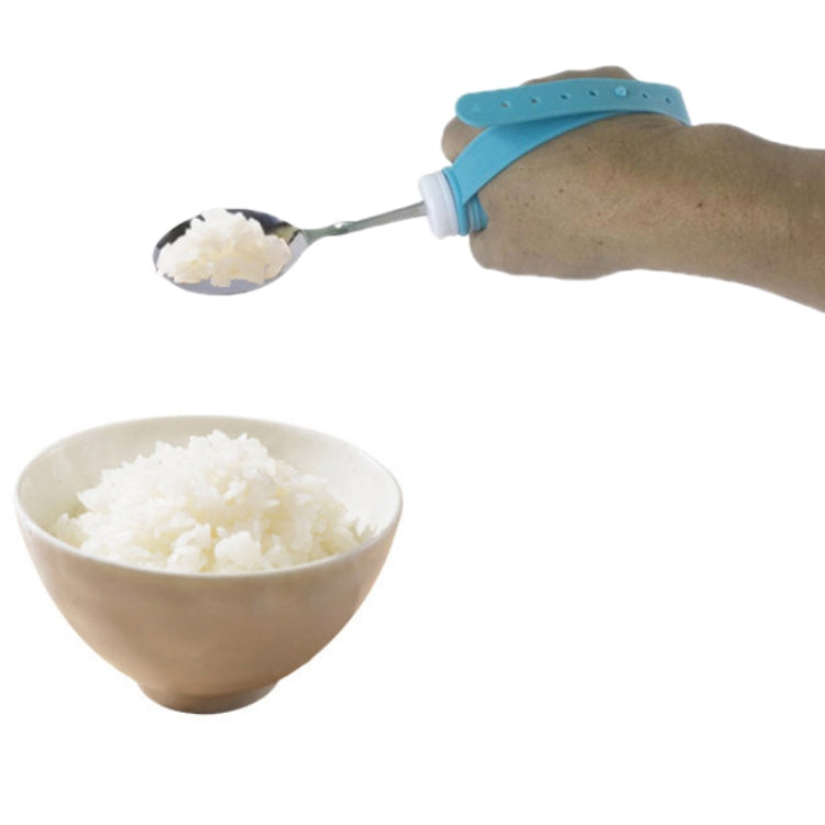 Stainless steel spoon scooping rice with blue silicone wrist-strap handle