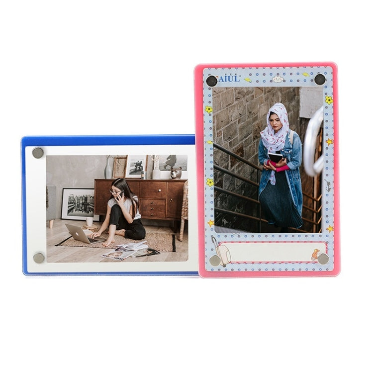 Blue and pink acrylic magnetic photo frames with decorative borders and corner magnets