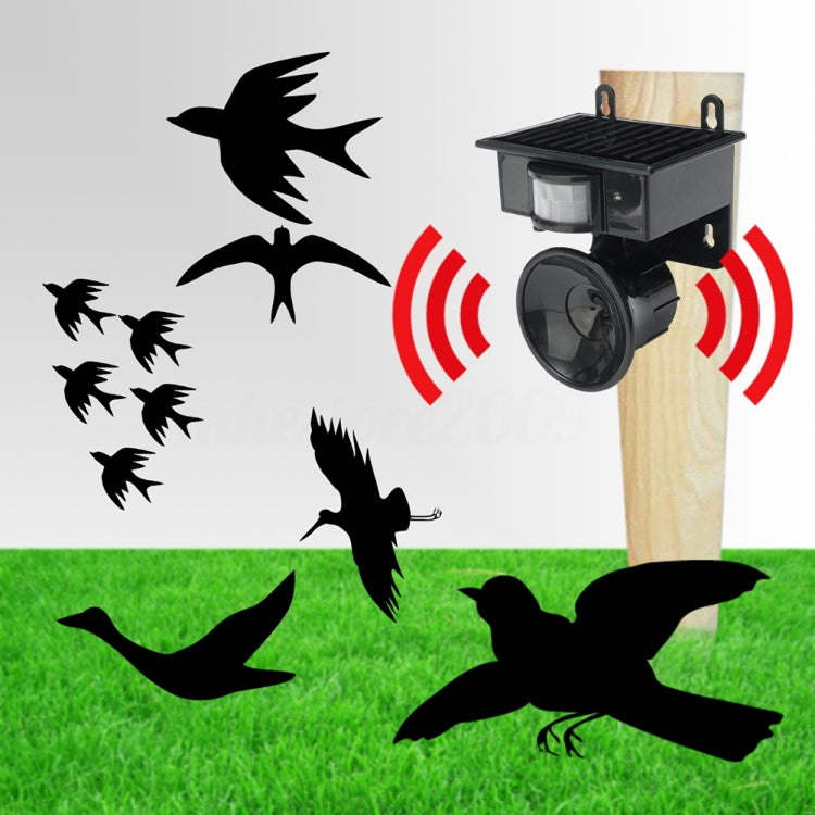 Solar ultrasonic animal repeller on a stake, with ultrasonic sound wave indicators