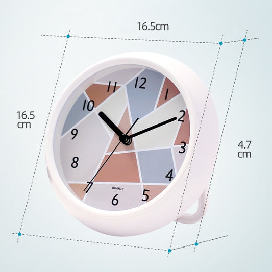 Round white clock with black hands, numeric markers, and quartz label; front view