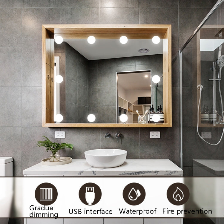 LED vanity mirror light set with white bulbs on a rectangular bathroom mirror