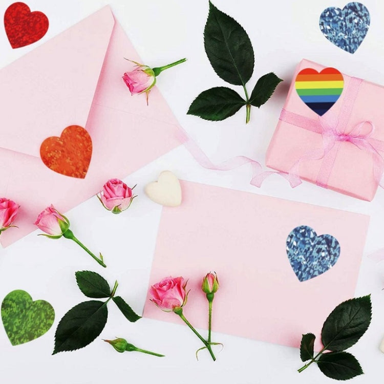 Assorted heart stickers on pink cards, including red, orange, and blue hearts