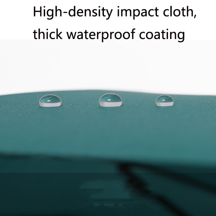 Teal umbrella fabric surface with water droplets, thick waterproof coating look