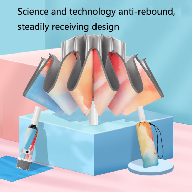 Assorted folded automatic umbrellas with watercolor red and blue panels