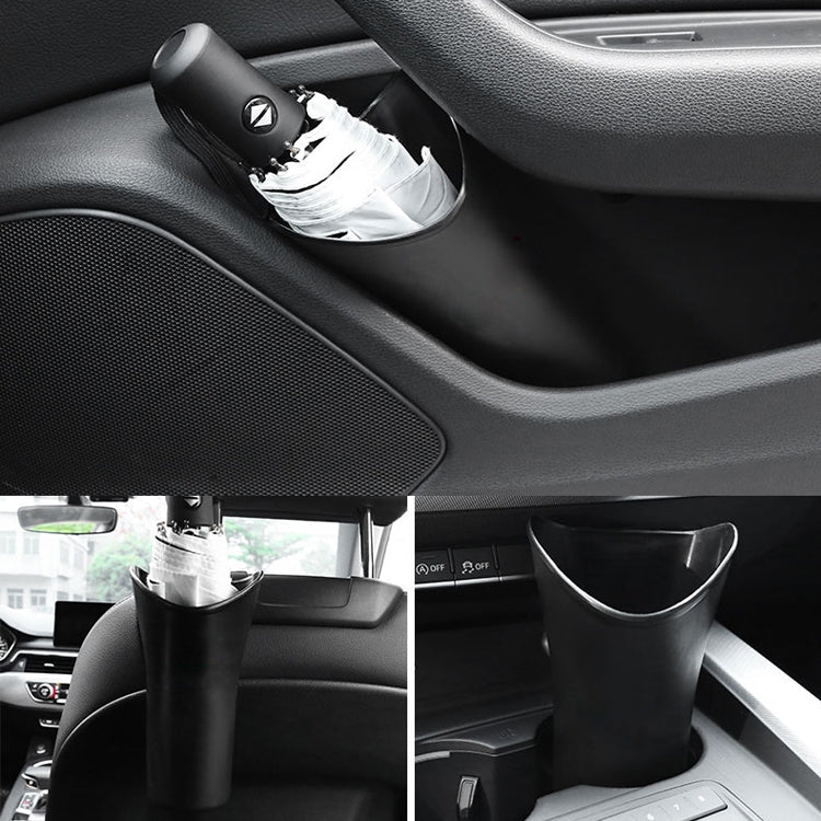 Black storage bucket mounted in car cabin next to dashboard