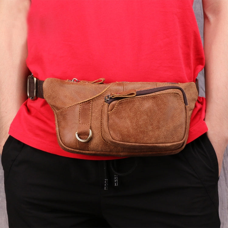 Brown leather waist bag worn on body, front zip pocket and adjustable strap