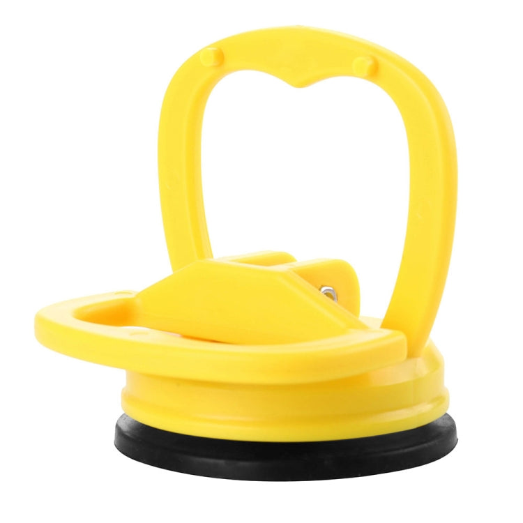 Yellow suction cup car dent repair puller tool with pull handle and base