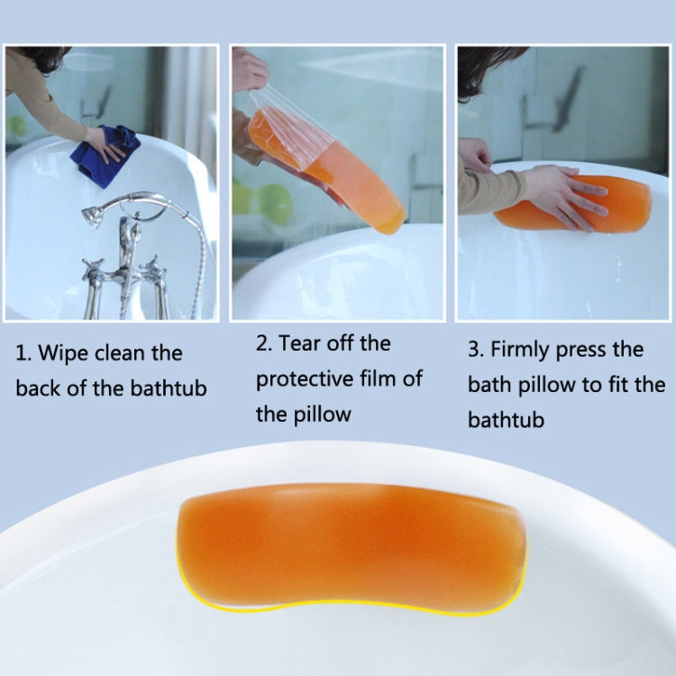 Orange contoured bath head pillow fitted in bathtub with suction