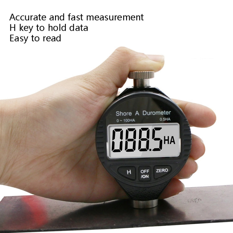 Digital durometer hardness tester with LCD 008.5 HA in hand, metal probe on base